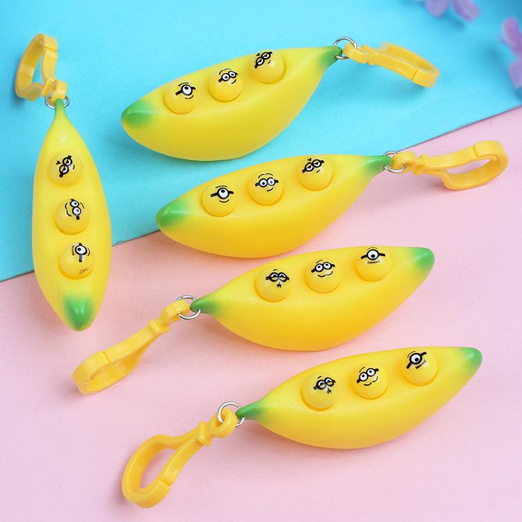 Creativity cute eye squeezing banana pinching music toy pressure relieving device doudou key chain pendant